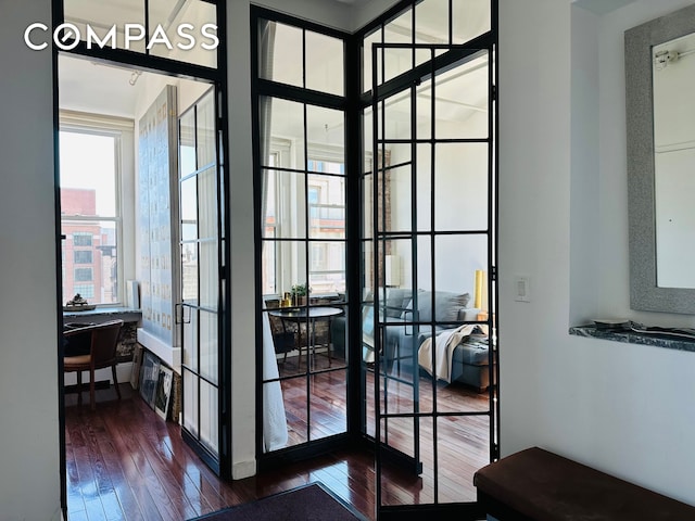 doorway to outside featuring hardwood / wood-style floors