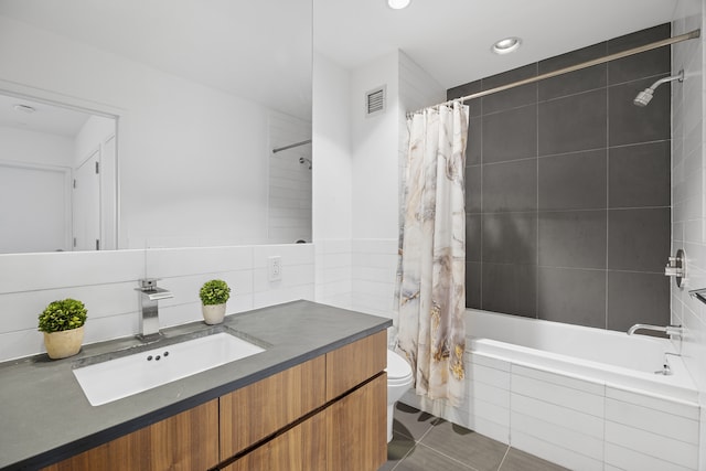 310 E Houston St Phc, Phc, New York City, NY 10002 - bathroom featuring tiled shower / bath, vanity, toilet, recessed lighting, and tile patterned floors