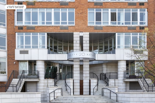 view of building exterior with stairway