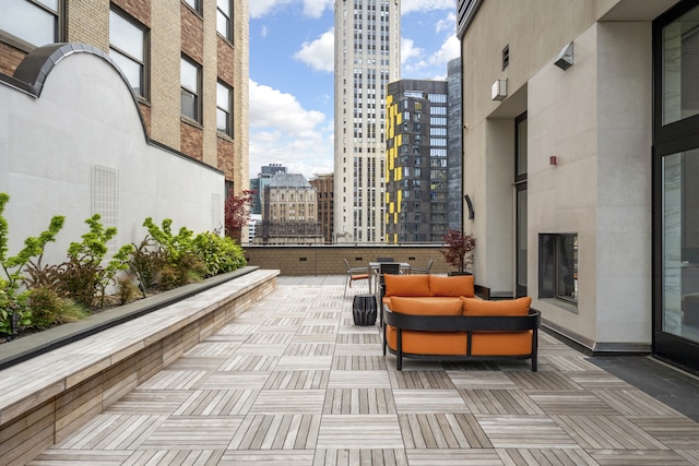 view of patio featuring a city view and an outdoor living space
