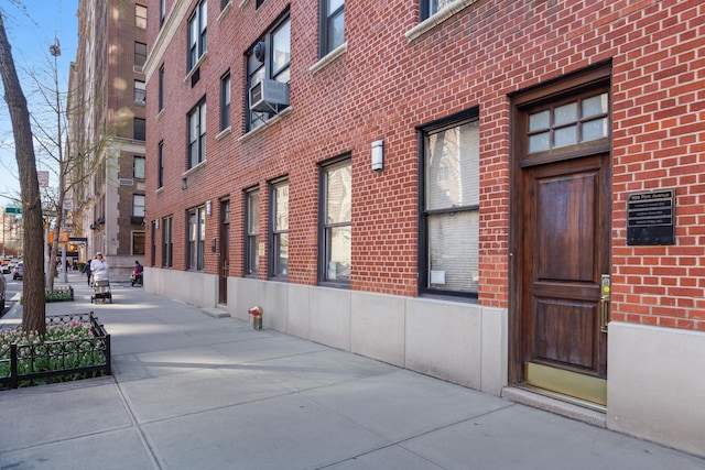 view of building exterior with cooling unit