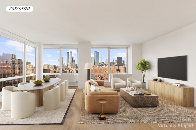 450 W 17th St Unit 2408, New York City, NY 10011 - living area with wood finished floors
