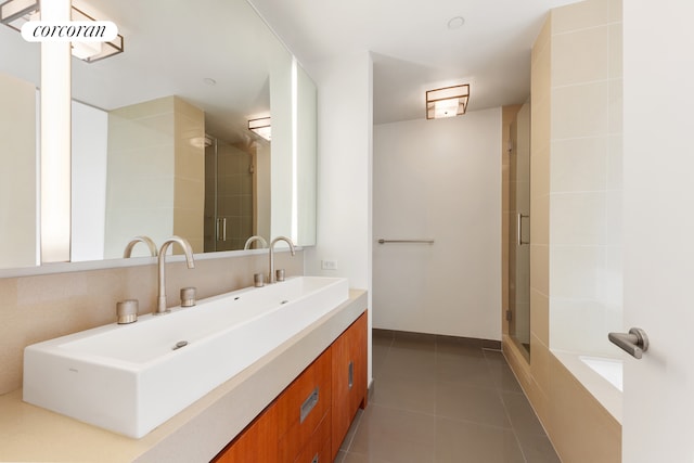450 W 17th St Unit 2408, New York City, NY 10011 - bathroom with vanity, a shower with door, and tile patterned flooring
