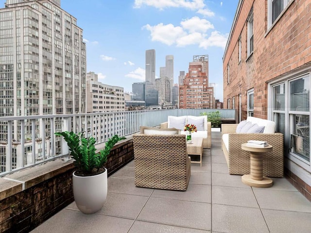 view of patio with an outdoor hangout area and a view of skyline