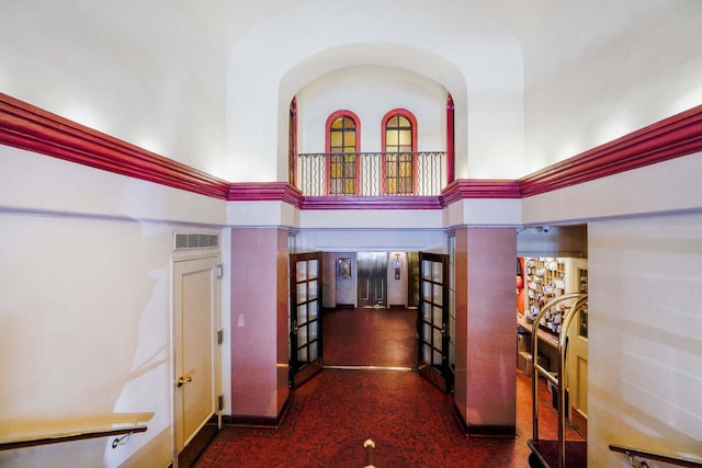 457 W 57th St Unit 911, New York City, NY 10019 - corridor featuring french doors and a high ceiling
