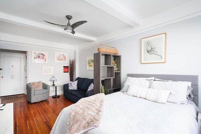 457 W 57th St Unit 911, New York City, NY 10019 - bedroom featuring beam ceiling, wood finished floors, and a ceiling fan