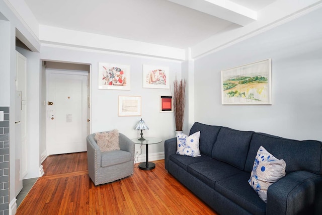 457 W 57th St Unit 911, New York City, NY 10019 - living area featuring wood finished floors and baseboards