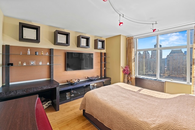160 W 66th St Unit 34-G, New York City, NY 10023 - bedroom featuring wood finished floors
