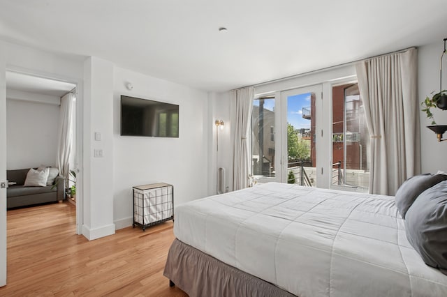 1059 Manhattan Ave Unit 2D, New York City, NY 11222 - bedroom featuring access to exterior and light wood-style flooring