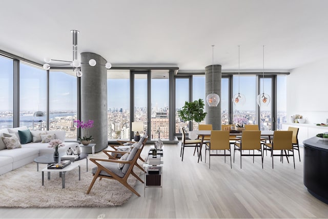 56 Leonard St Unit 43West, New York City, NY 10013 - living room featuring a wall of windows and wood finished floors