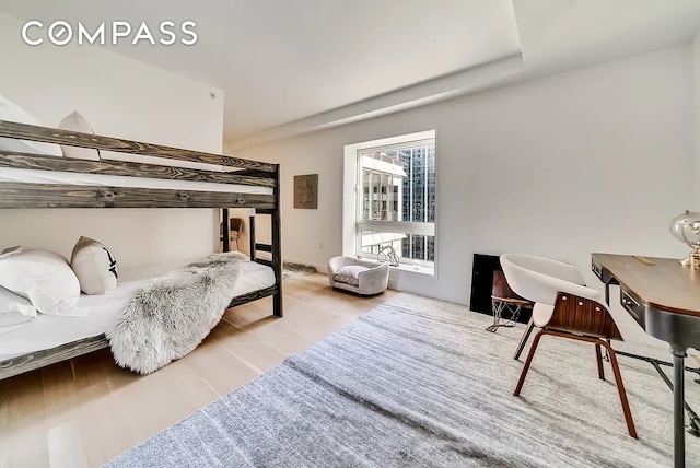 135 W 52nd St Unit 40A, New York City, NY 10019 - bedroom featuring wood finished floors