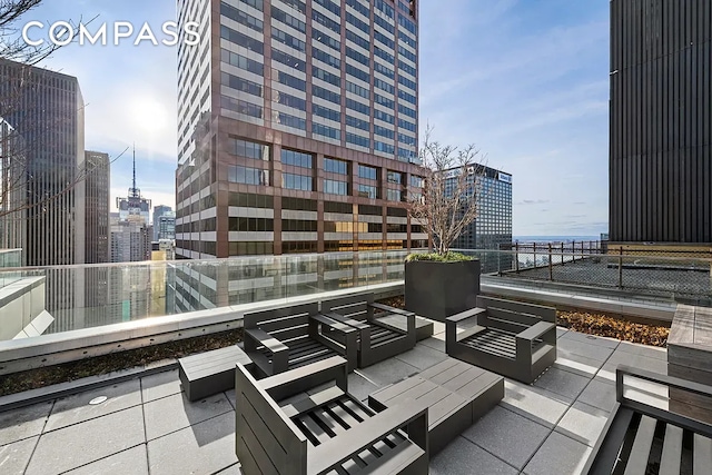 135 W 52nd St Unit 40A, New York City, NY 10019 - patio / terrace with outdoor lounge area and a view of city