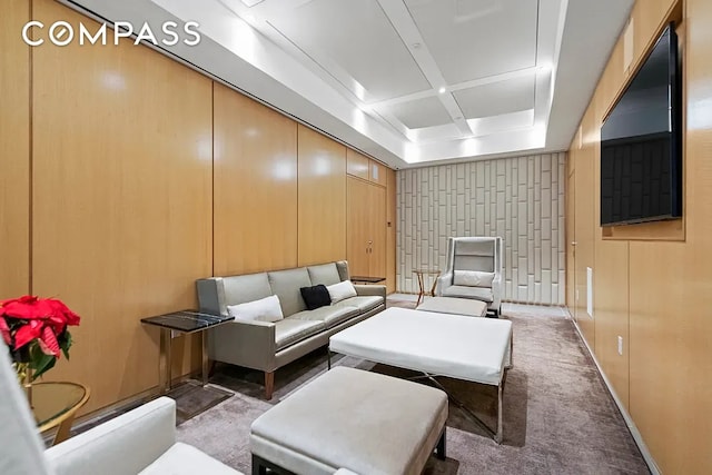 135 W 52nd St Unit 40A, New York City, NY 10019 - carpeted living room featuring baseboards