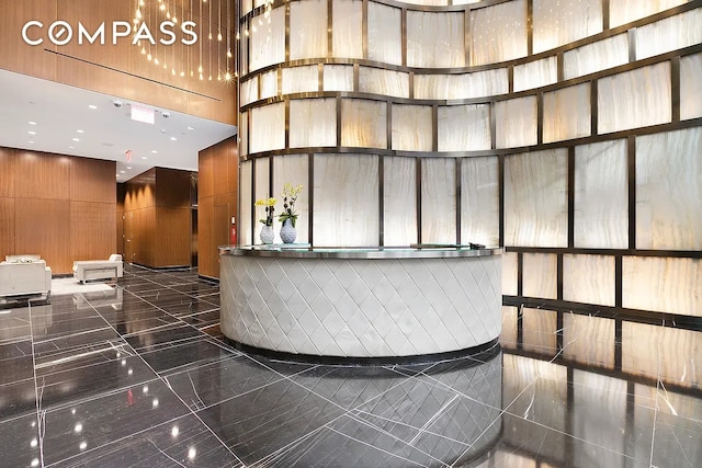 135 W 52nd St Unit 40A, New York City, NY 10019 - reception with a towering ceiling