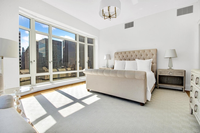 bedroom featuring visible vents