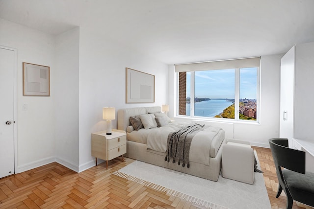 bedroom featuring baseboards