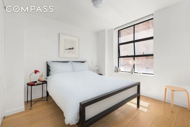 bedroom featuring light wood finished floors