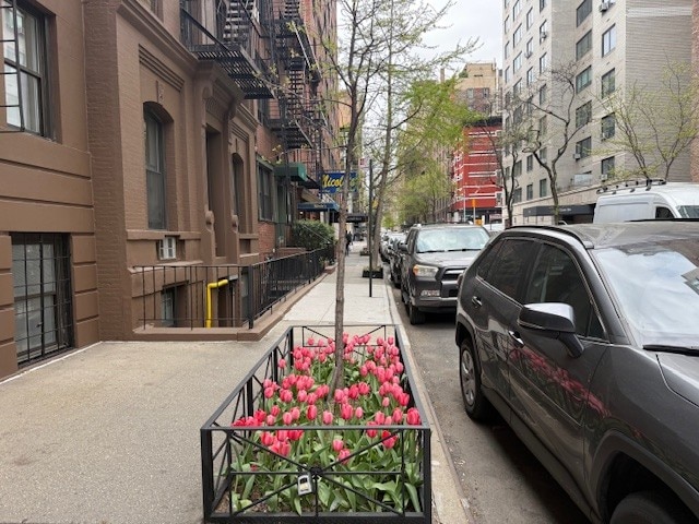 148 E 84th St Unit 2A, New York City, NY 10028 - view of asphalt road with sidewalks
