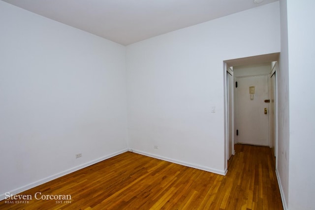 148 E 84th St Unit 2A, New York City, NY 10028 - unfurnished room featuring wood finished floors and baseboards