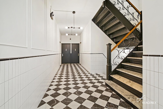 entryway featuring stairs