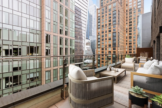 517 W 29th St Phc, Phc, New York City, NY 10001 - balcony featuring outdoor lounge area and a city view