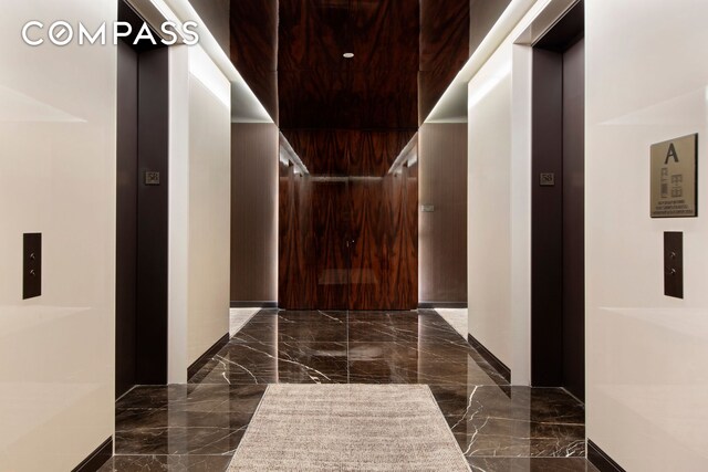 35 Hudson Yards Unit 5805, New York City, NY 10001 - hallway with dark marble finish floors