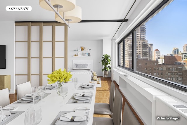 interior space with a view of city and visible vents