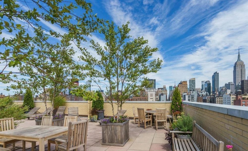 200 W 20th St Unit 816, New York City, NY 10011 - view of patio featuring outdoor dining space and a skyline view