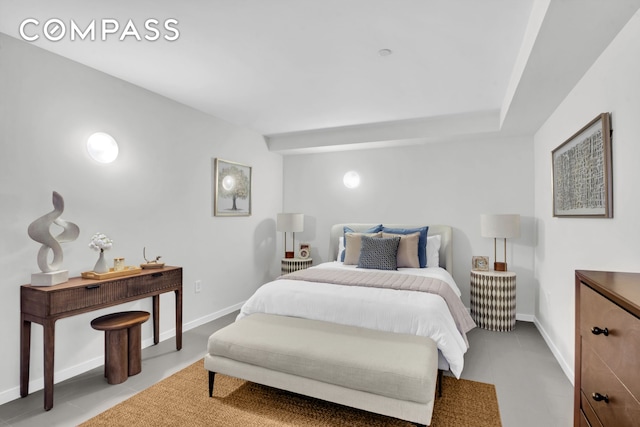 bedroom featuring baseboards