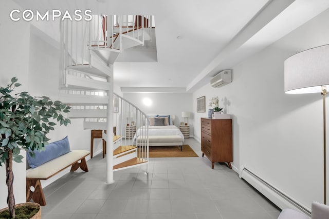 bedroom with a baseboard radiator, an AC wall unit, and a high ceiling