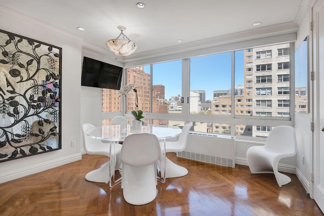 dining area with baseboards, recessed lighting, and radiator heating unit