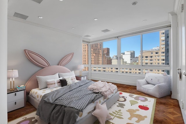 bedroom featuring a view of city and crown molding