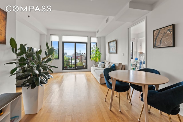 21-10 44th Dr Unit C6, New York City, NY 11101 - dining room featuring light wood-type flooring