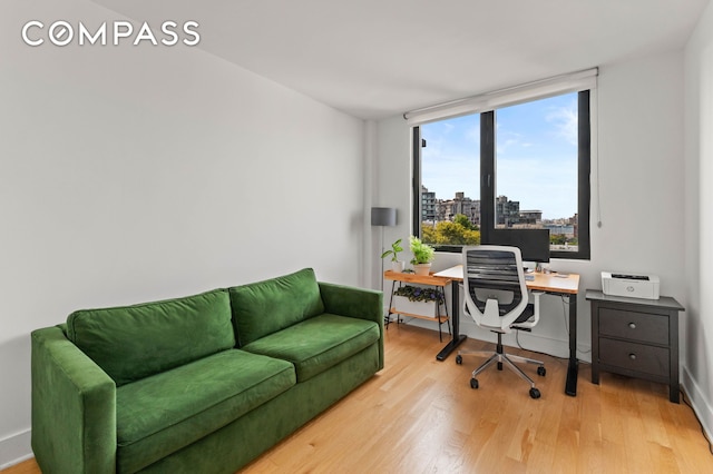 21-10 44th Dr Unit C6, New York City, NY 11101 - office area with light wood-style floors