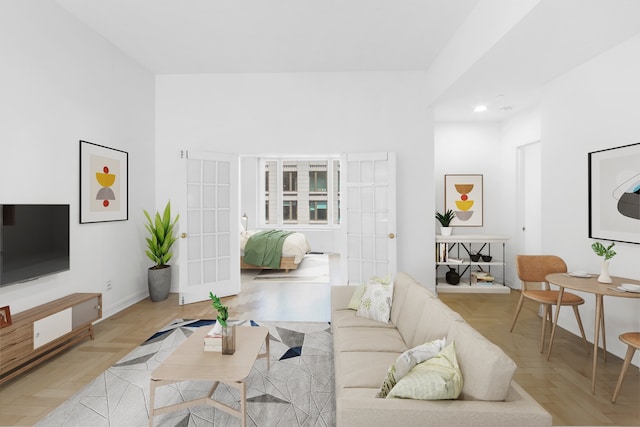 living room featuring recessed lighting and baseboards