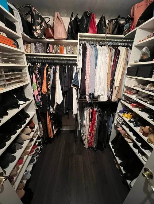 spacious closet featuring dark wood finished floors