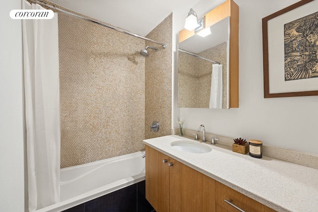 bathroom with shower / bath combo with shower curtain and vanity