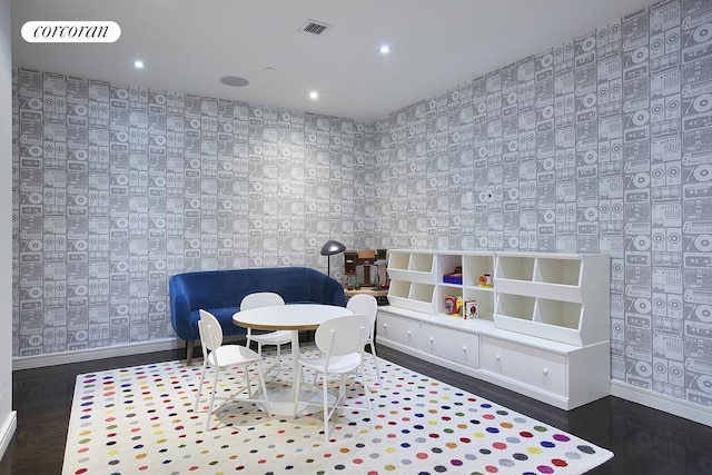 sitting room with recessed lighting, visible vents, baseboards, wallpapered walls, and wood finished floors