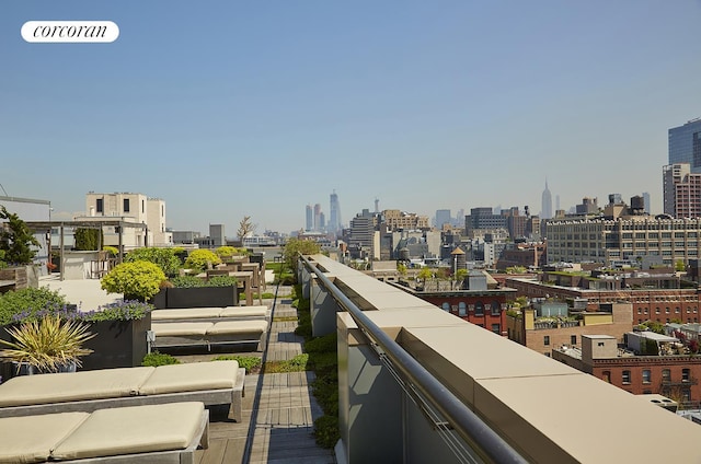 balcony featuring a view of city