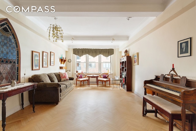33 E End Ave Unit 9F, New York City, NY 10028 - living area with baseboards, ornamental molding, and a chandelier