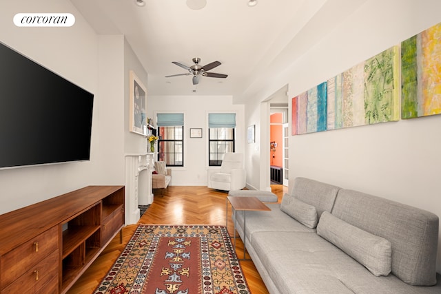 living room with visible vents, a ceiling fan, and recessed lighting