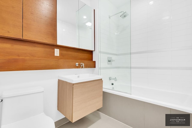 333 E 109th St Unit 6B, New York City, NY 10029 - full bathroom with vanity, tiled shower / bath combo, toilet, and tile patterned floors
