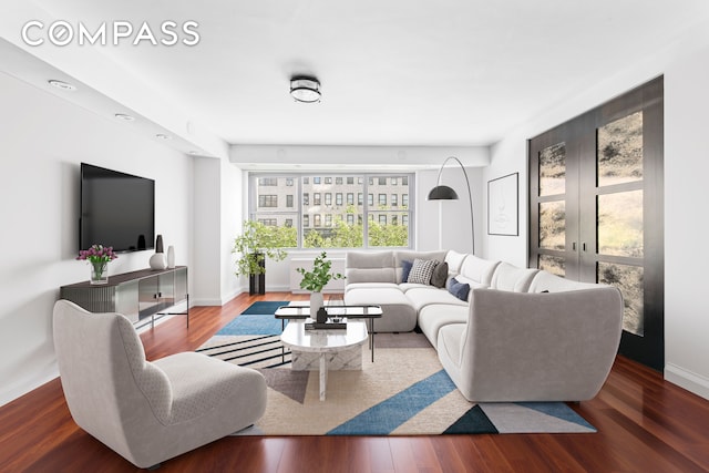 400 E 56th St Unit 3D, New York City, NY 10022 - living room with wood finished floors and french doors