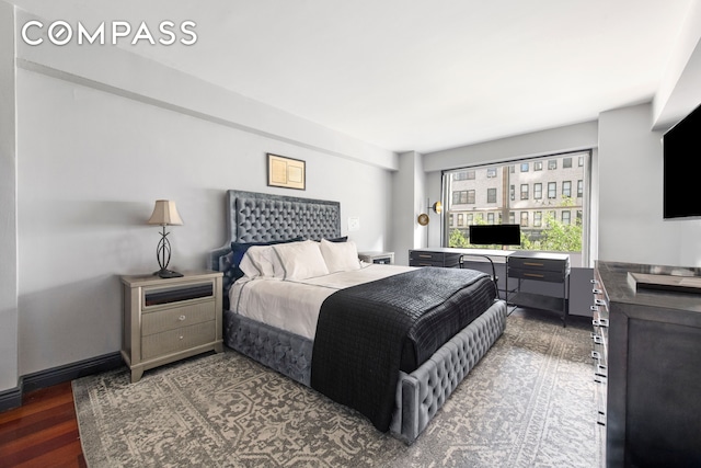 bedroom featuring wood finished floors