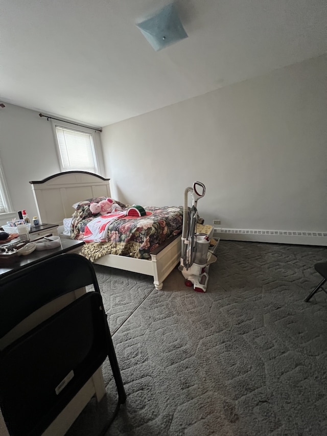 1774 E 54th St Unit 13B, New York City, NY 11234 - carpeted bedroom featuring a baseboard heating unit