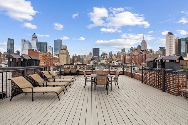 252 W 20th St Unit 3B, New York City, NY 10011 - deck with a skyline view and outdoor dining space