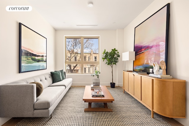 living room featuring visible vents and baseboards