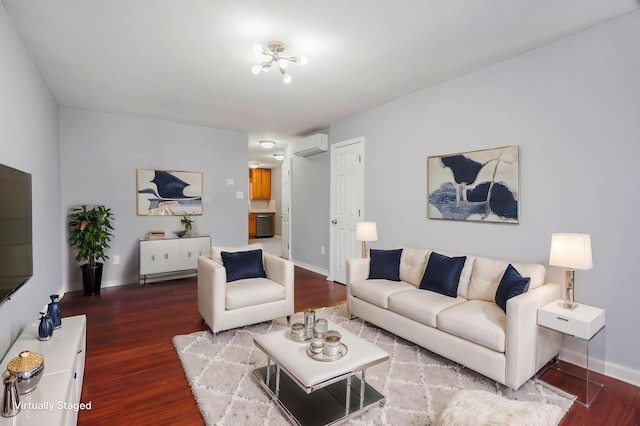 living area featuring a wall unit AC, wood finished floors, and baseboards
