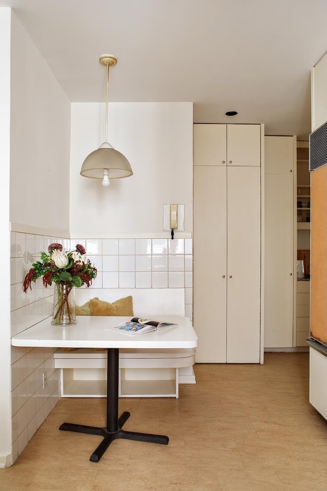 interior space featuring tile walls
