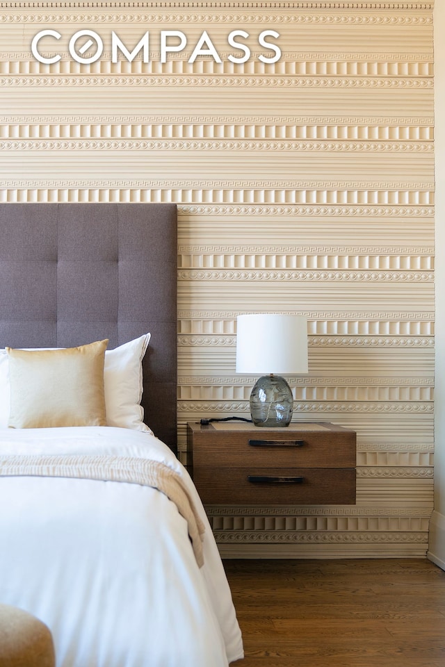 bedroom featuring wood finished floors